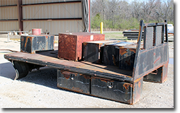 Rusty flatbed and steel boxes needing blasted, priming and painting